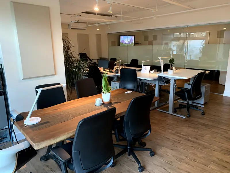 The shared work table and meeting area in the Digital Desks office